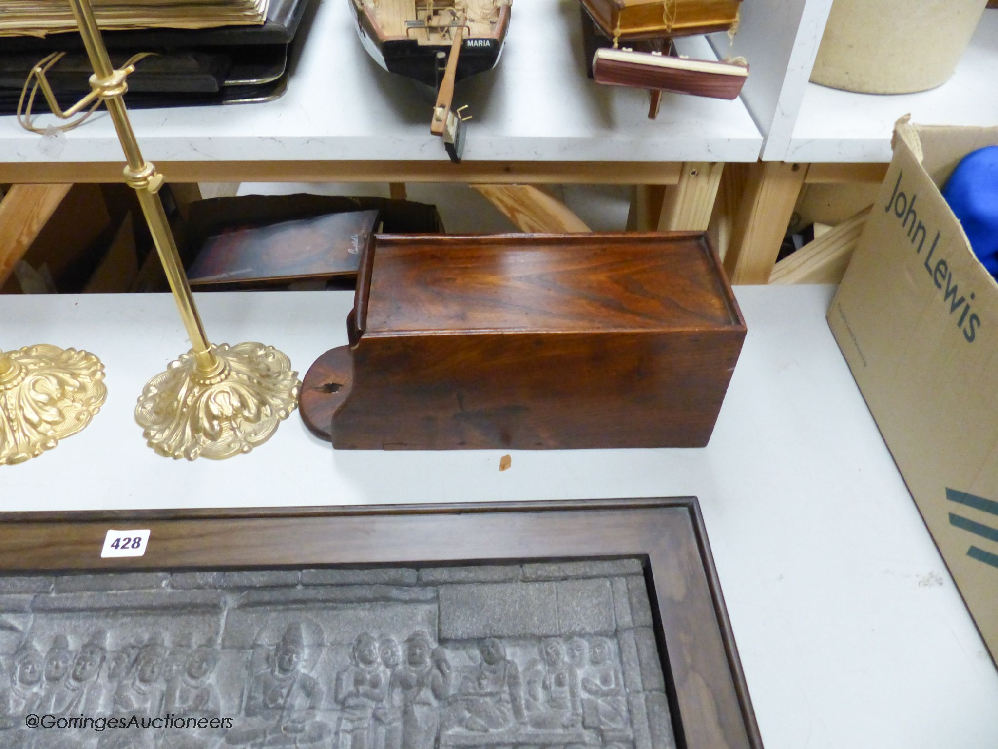 A pair of gilt hat and scarf stands, a temple plaque and a salt box